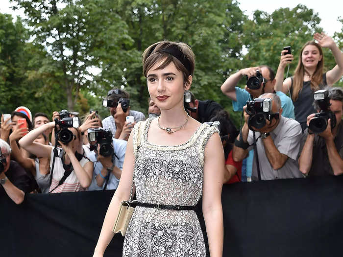 Collins looked chic in a sheer black-and-white look during Paris Fashion Week in July 2015.