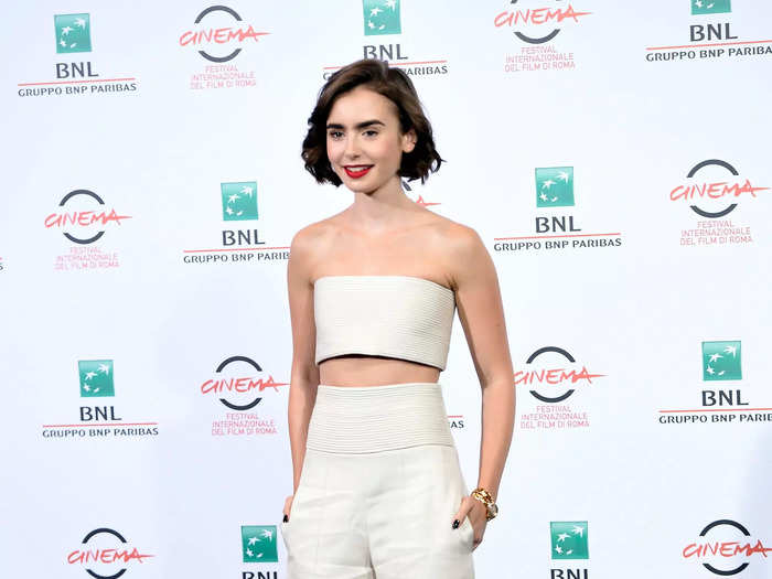 Collins wore a Pamella Roland crop top and pants while attending the Rome Film Festival in October 2014.