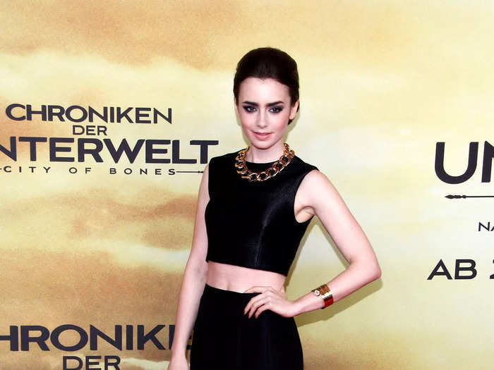 She rocked a crop top and skirt again at "The Mortal Instruments: City of Bones" premiere later that same month.