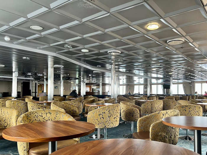 While the Drake Passage was definitely an experience in itself, the boat had several rooms and activities that provided entertainment, like the Nautilus Lounge, which featured tables and chairs...