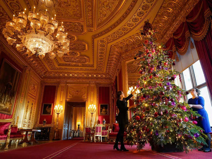 Another grand tree stands in the Crimson Drawing Room at Windsor.