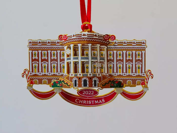 The official White House Christmas ornament is embellished with snowflakes and candy canes.