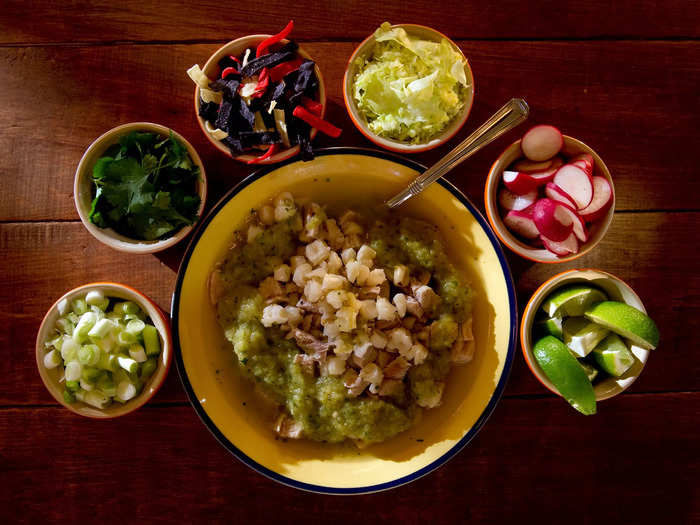 Red or green pozole is a Mexican soup that my family eats together on Christmas day and other special occasions.