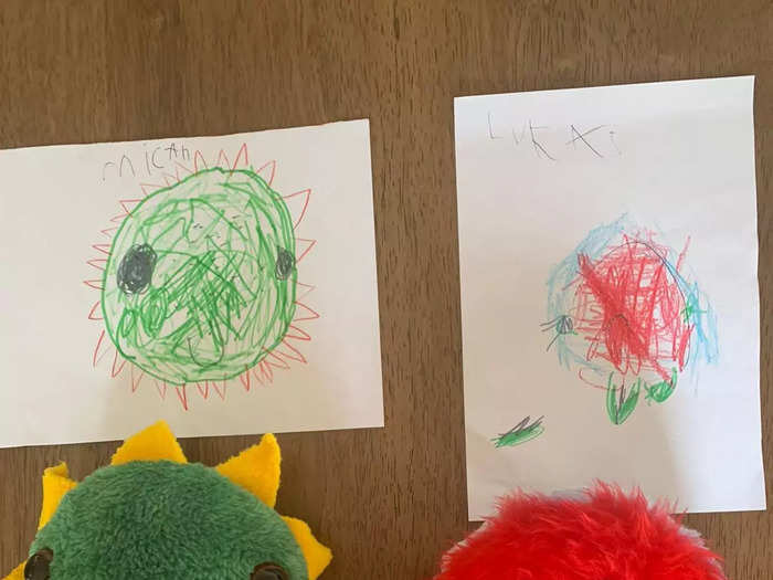 A drawing of a monster and the monster made into a toy that looks exactly like it