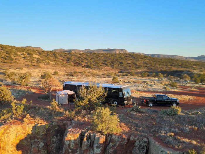 The family traversed the United States with the travel trailer in 2020 before upgrading to their current bus-turned-tiny home in May 2021.