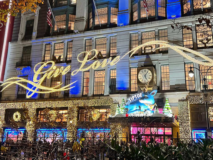 This year, the store ditched its traditional "Believe" sign, a reference to "A Miracle on 34th Street," and is displaying a large "Give Love" instead.