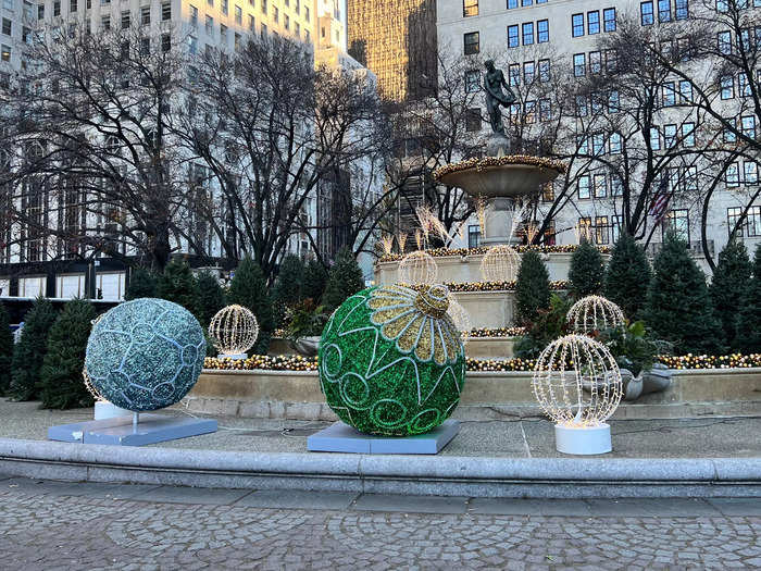 Across the street, the Pulitzer Fountain, which you might recognize from "Home Alone 2," was decorated as well. A musician was singing "Have Yourself a Merry Little Christmas."