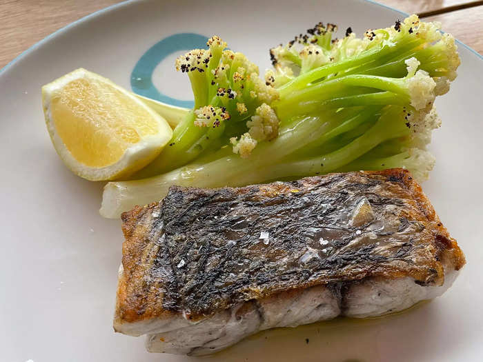 Below the Sydney Opera House, I dined on barramundi for the first time.