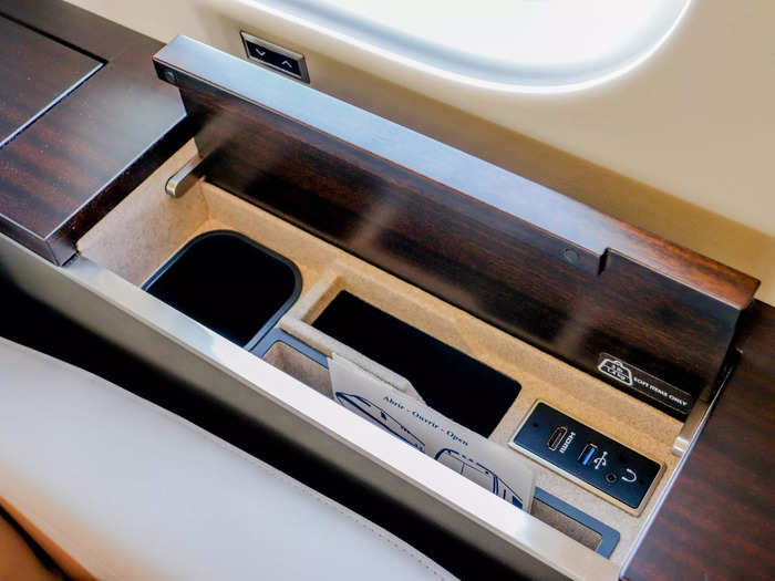 Also onboard the jet are several other amenities, including power outlets and retractable tables…