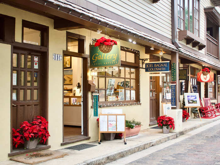 Strolling through the Historic District, I saw colorful signs and stucco walls, potted flowers, and narrow brick streets.