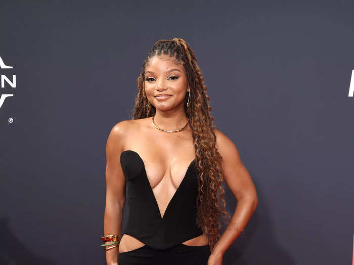 Halle Bailey attended the 2022 BET Awards in June wearing a bold black gown with cutouts and a neckline that almost reached her belly button.