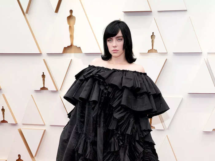 Billie Eilish wore an edgy off-the-shoulder Gucci dress that resembled a ruffled duvet.