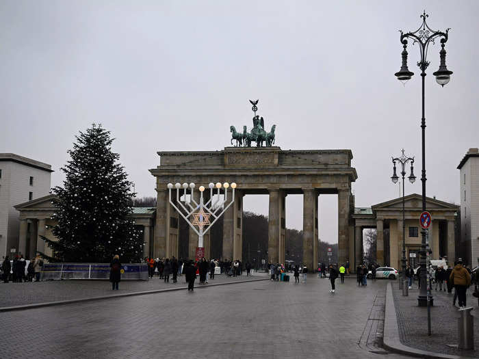 NOW: The Brandenburg Gate in 2022, now an iconic landmark and a symbol of a reunited Berlin after the Cold War.