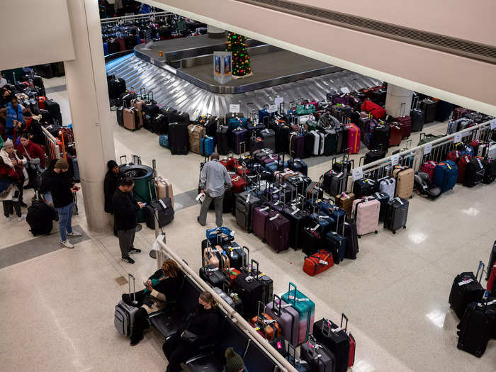 Passengers at Chicago Midway International Airport searched for their luggage on Tuesday at Southwest