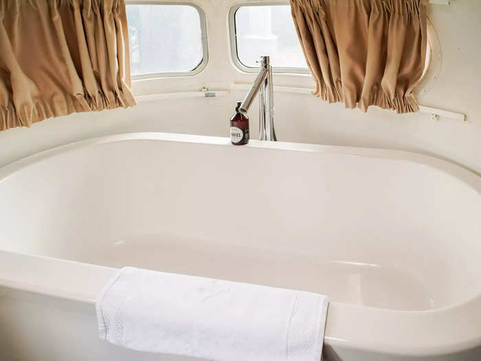 As soon as I stepped inside the Airstream, the first thing I noticed was a large bathtub to my right. I knew the trailer had a tub when I booked, but thought it would be in a private bathroom.