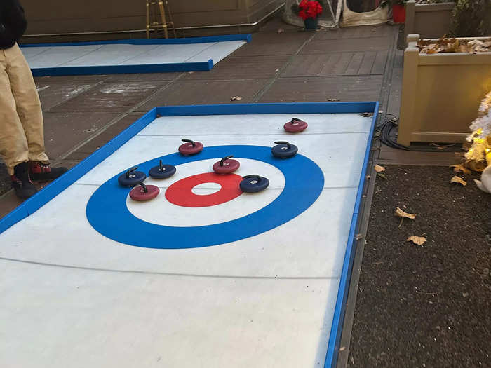 Our lane came with eight curling stones – four pink and four blue. There were only enough for two teams, so an even number of guests is ideal.