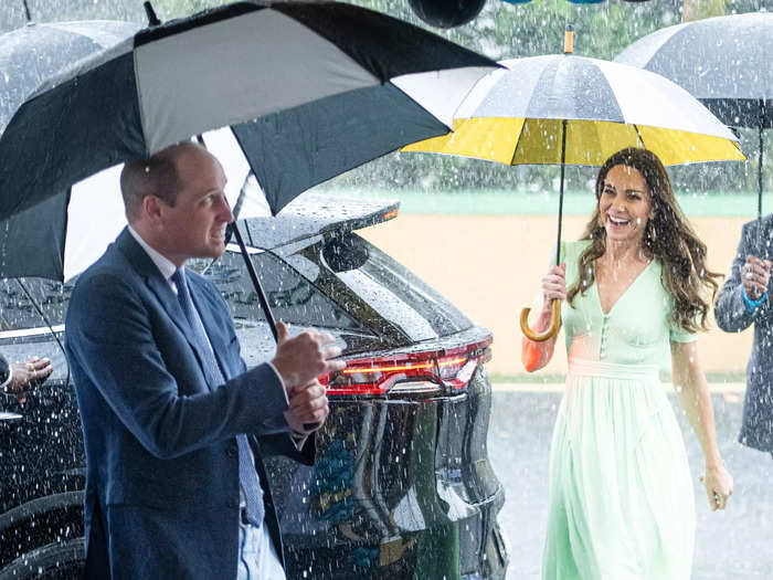 This photo of Prince William and Kate in the rain during their royal tour of the Caribbean is another one of Hussein