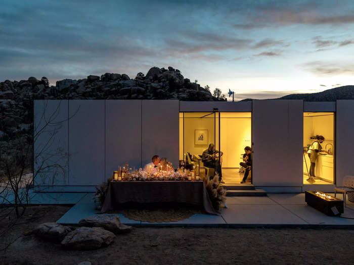 The real star of this photo is the unique Airbnb the couple chose for their big day.