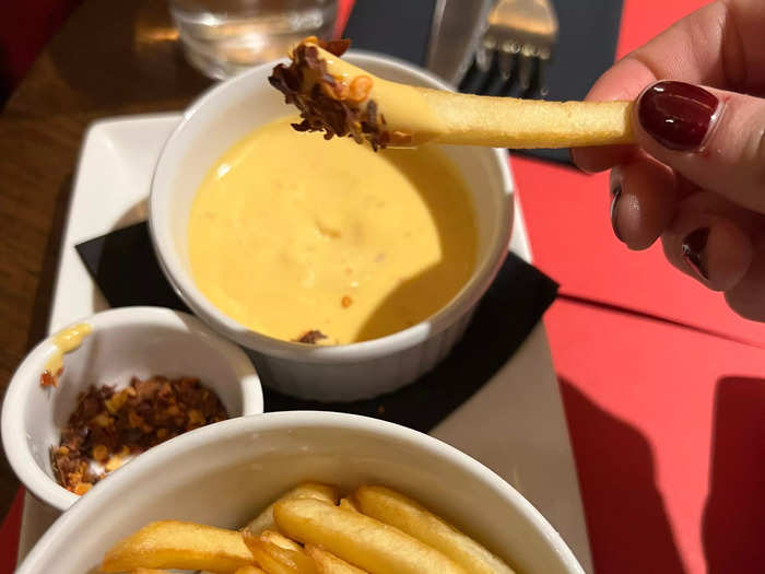 I thought dipping the fries in melted cheese and chili flakes was a fun alternative to ketchup and mayo.