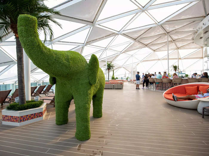 7. The adults-only solarium has three hot tubs, a multi-level pool, and animal topiaries.