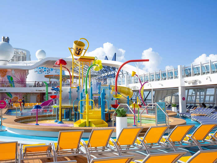 The colorful chairs, pools, and slides make the pool deck an overwhelming feast for the eyes.