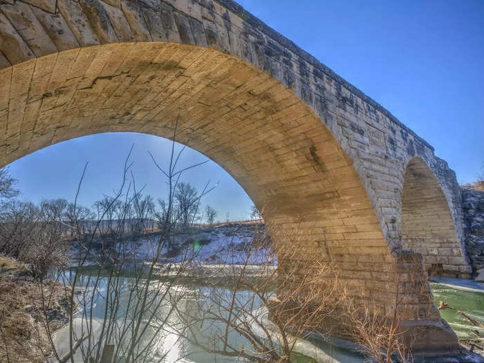 Aside from the property, an arched bridge is the only other remaining structure in the Crawford ghost town, Legends of Kansas reports.