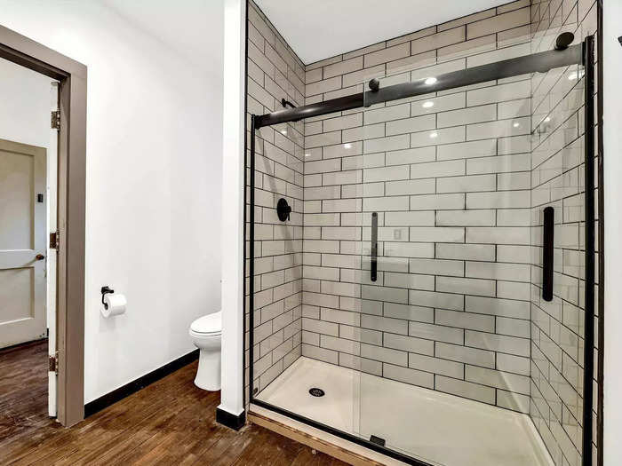 According to the listing, the property also has a renovated bathroom, where visitors will find a tile-lined shower, toilet, and vanity.