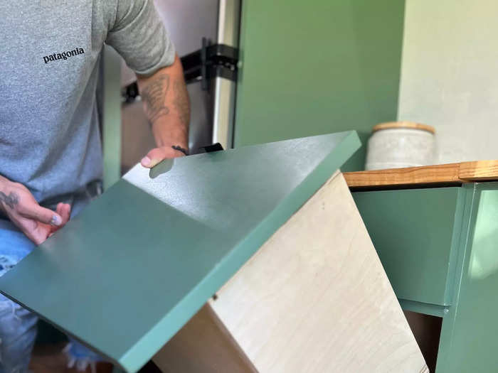 One of the kitchen drawers opens to reveal a secret compartment.