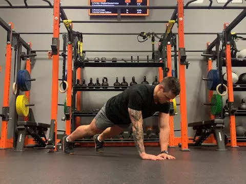 Jake Harcoff demonstrates a diamond push-up, one of the best push-ups for improving strength