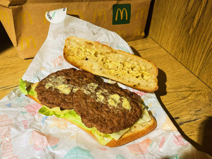 The McBaguette came with two beef patties, lettuce, Swiss cheese, and a smear of mustard on a small baguette-like roll.