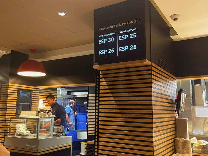 After ordering my food at the counter, I watched a screen displaying numbers for orders that were ready to be picked up.