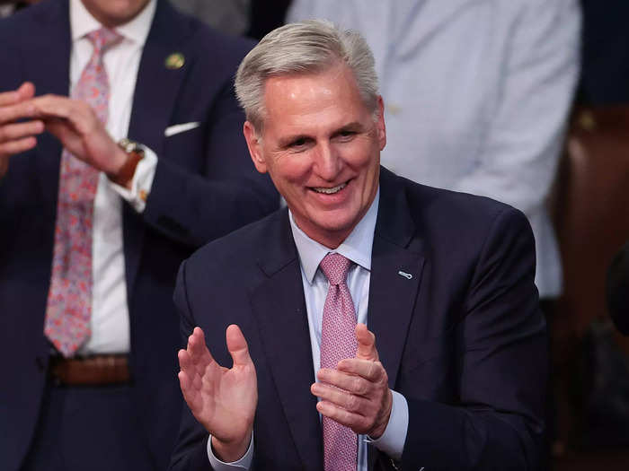 McCarthy grins and claps for his long-awaited victory early Saturday morning.