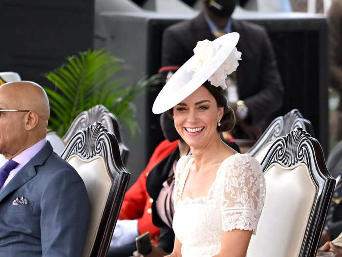 Kate wore a white lacy dress and matching fascinator on her last day in Jamaica.