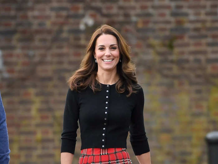 Kate got into the Christmas spirit for a party at Kensington Palace.