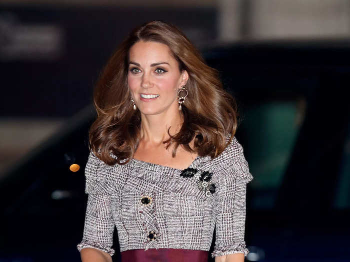 Kate wore a plaid dress after returning from royal maternity leave in 2018.