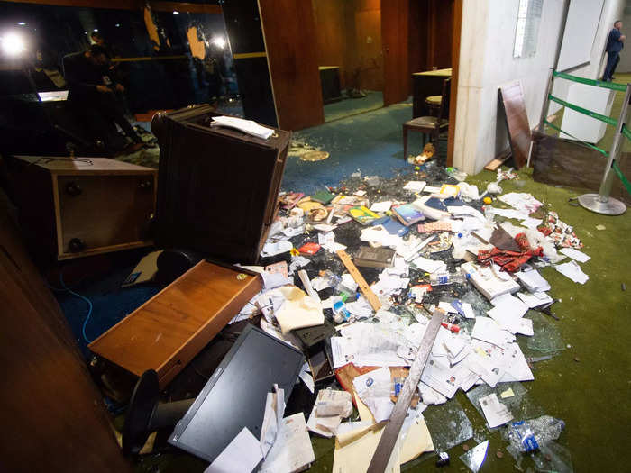 Pro-Bolsonaro protesters had ransacked offices in the government buildings, destroying furniture and leaving papers scattered across the floor.