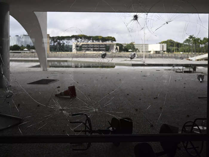 As the dust settled from the chaos, broken glass and furniture could be seen strewn across the property of Brazil