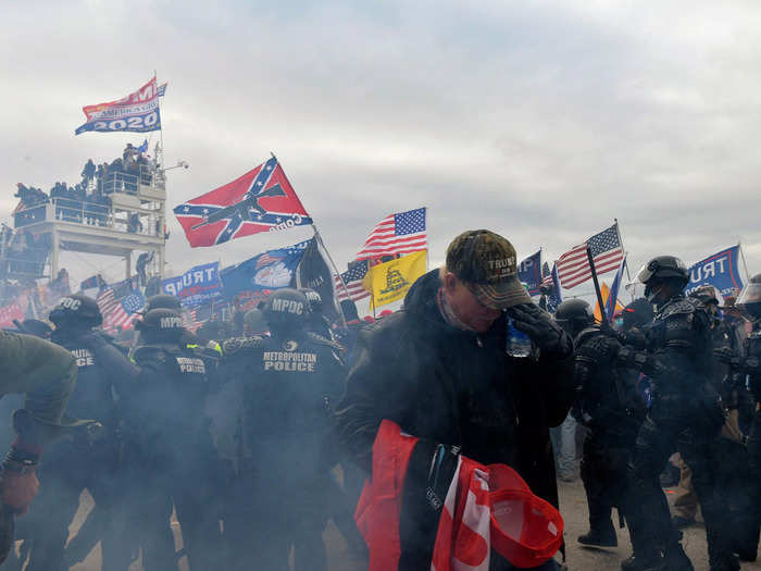 Pro-Trump supporters who clashed with police were also pepper-sprayed and subjected to tear gas. Nearly 1,000 people have been charged in relation to the Capitol insurrection.