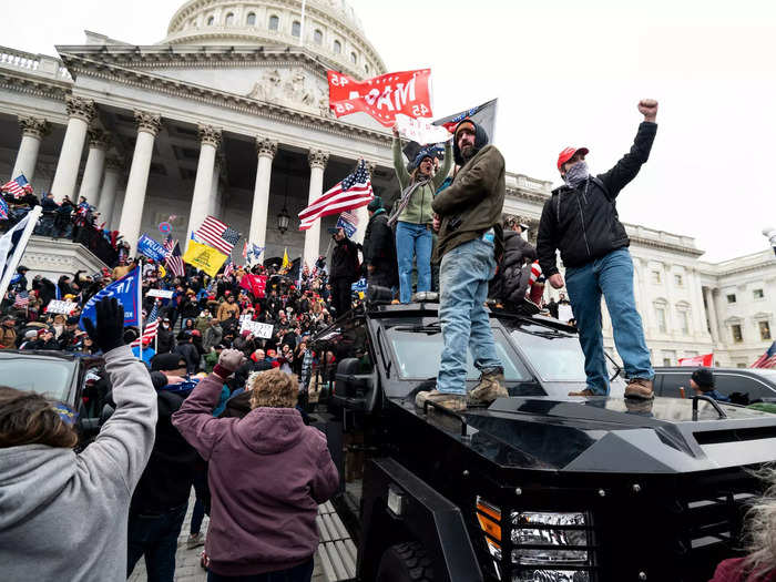 Trump supporters also used the armored vehicle of US Capitol Police as a platform to wave flags and amp up the unruly crowd.