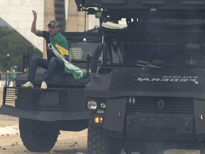 Security forces responded to Planalto Presidential Palace, and some protesters were seen sitting atop armored vehicles as officers tried to disperse the crowds.