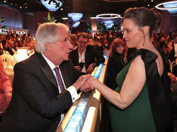 Henry Winkler and Hilary Swank had a moment at the event, with Winkler cupping Swank