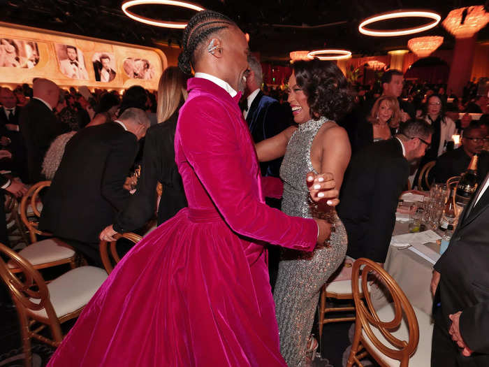 Billy Porter and Angela Bassett looked delighted as they greeted each other on the floor. Bassett won the award for best supporting actress in a motion picture.