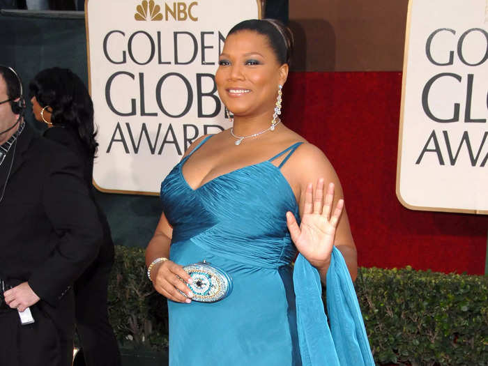 January 2006: Queen Latifah looked elegant in a simple blue dress.