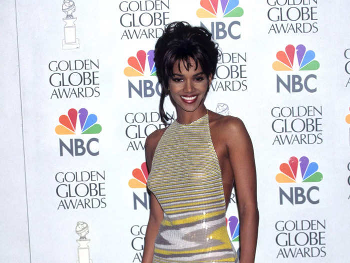 January 1997: Halle Berry dazzled the awards ceremony in a patterned and sparkly gown.