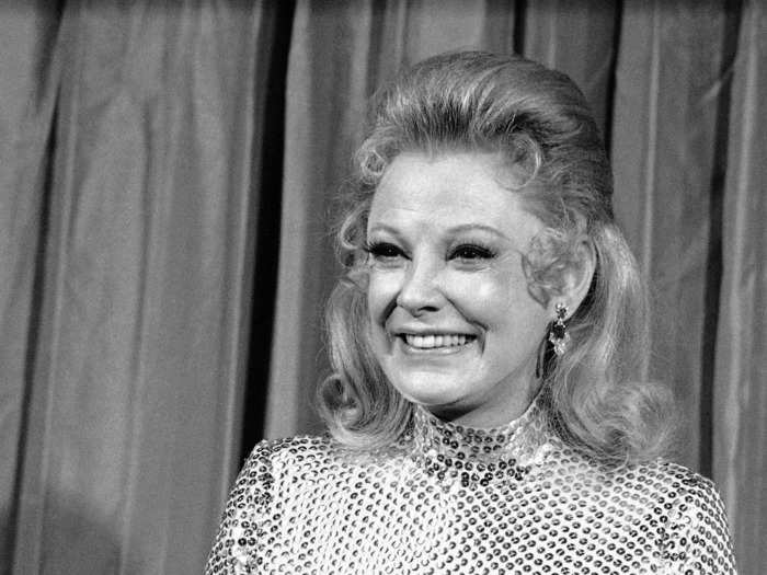 January 1974: June Allyson glowed while wearing a sparkly turtleneck dress.