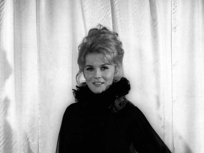 February 1972: Ann-Margret chose a sheer black ensemble with a ruffled collar.