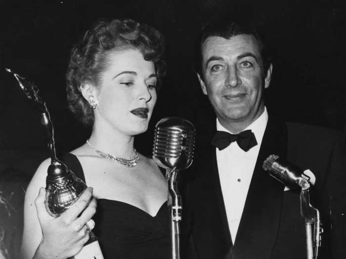 February 1954-1955: Robert Taylor donned a traditional tuxedo while receiving the world film favorite — male award.