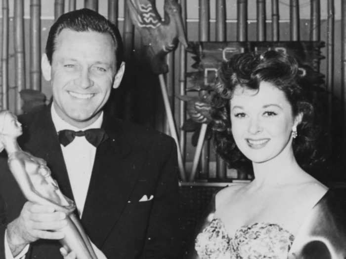 February 1953: Susan Hayward chose a strapless, patterned ball gown for the occasion.