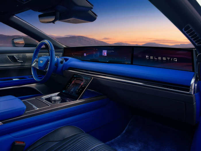 Its interior is packed with five screens, including a 55-inch display spanning the dashboard and a slanted "command center" for the climate settings.