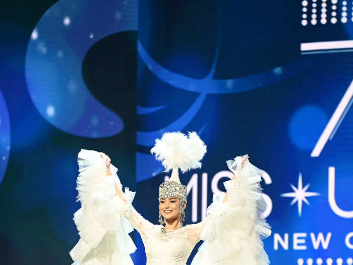 Miss Kyrgyzstan Altynai Botoyarova channeled a swan with her white gown that had a feathered skirt and coordinating sleeves.